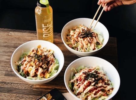 Three Poke Bowls with a Rise Kombucha on a Table