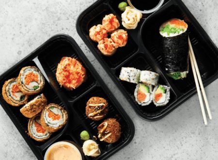 Mix platters of sushi, burrito sushi, pizza sushi and teriaki bomb