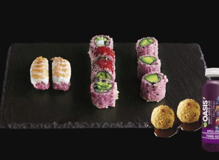 Variety of sushi with pink rice